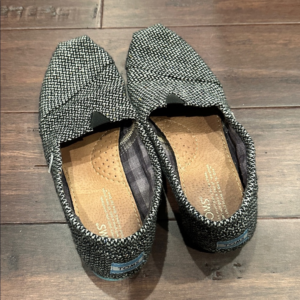 TOMS Textured Black and White Slip-Ons